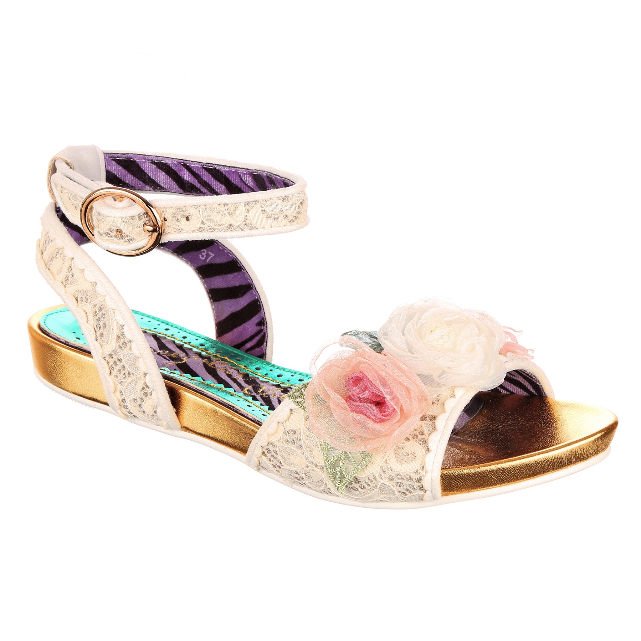 White lace open toe flat bridal sandal with buckle fastening ankle strap and pink and white 3D floral decorations on a white background