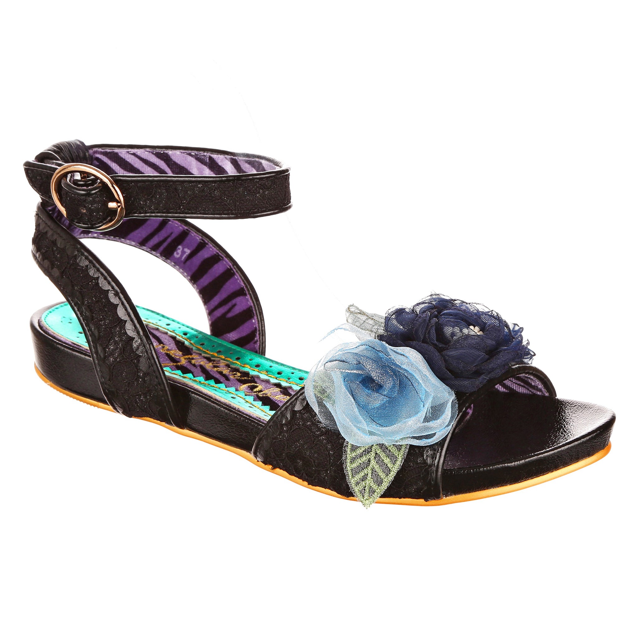 Black open toe flat sandal with black glitter ankle strap and 3D floral decorations on a white background