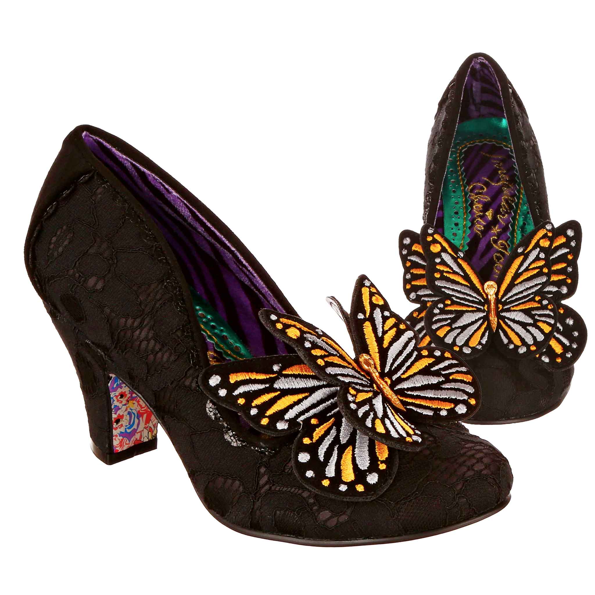 Black lace high-heeled slip on shoes with 3D butterfly designs on the toe on a white background