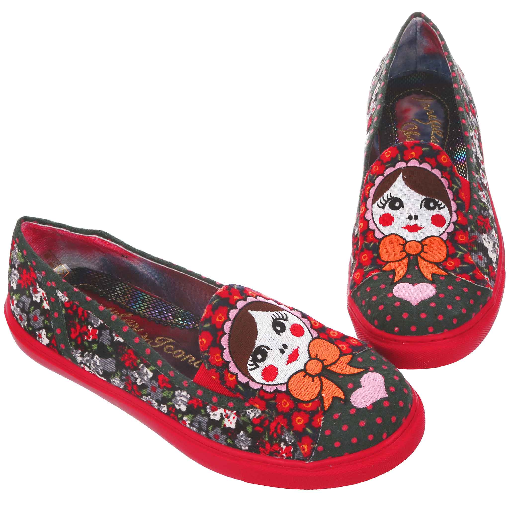 A pair of women's slip-on flats with a colorful floral corduroy design, contrasting polka dots, and an embroidered dolly on the toe.