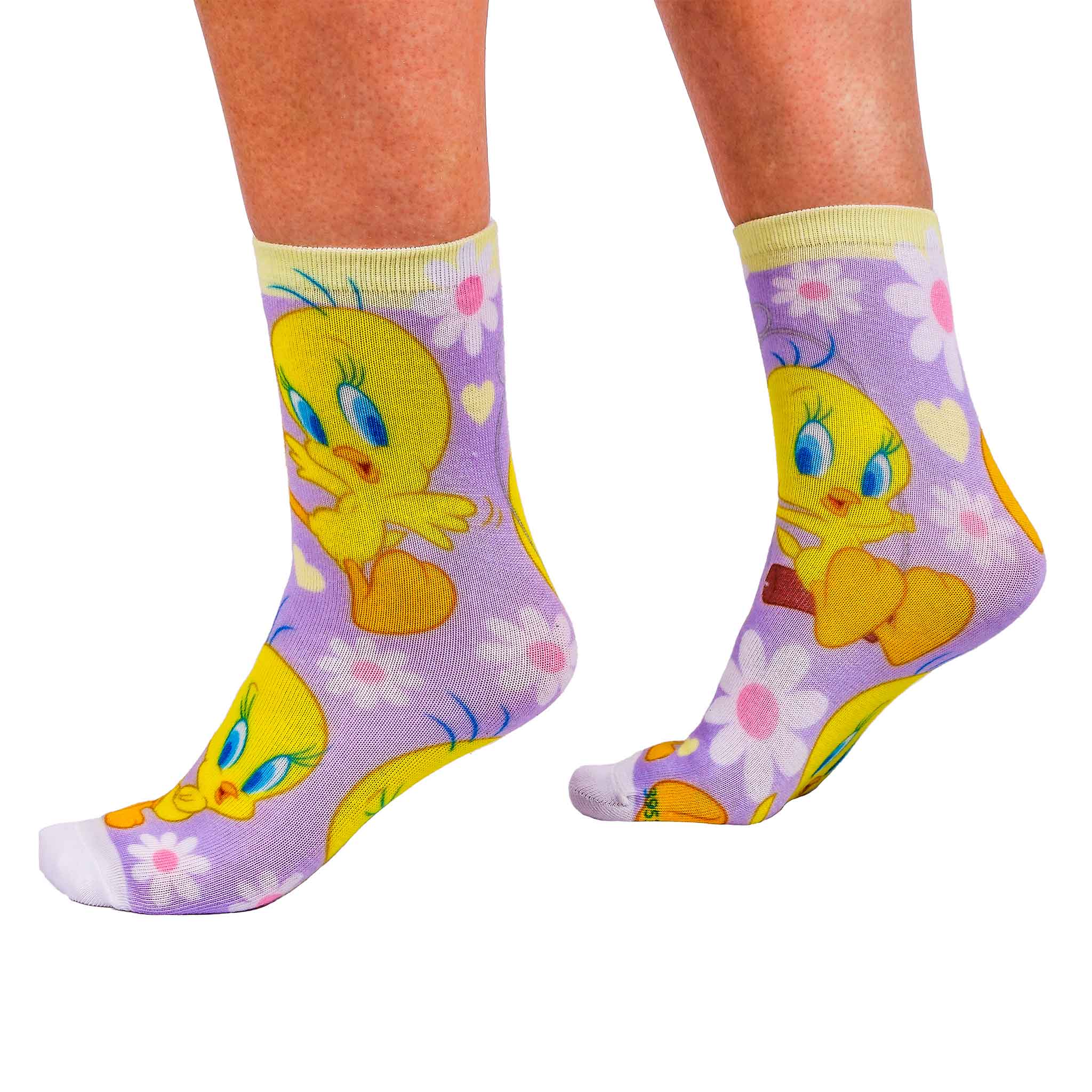 Lilac socks are printed with white and pink flowers, light yellow hearts and Tweety Bird, finished with a light yellow ankle band.